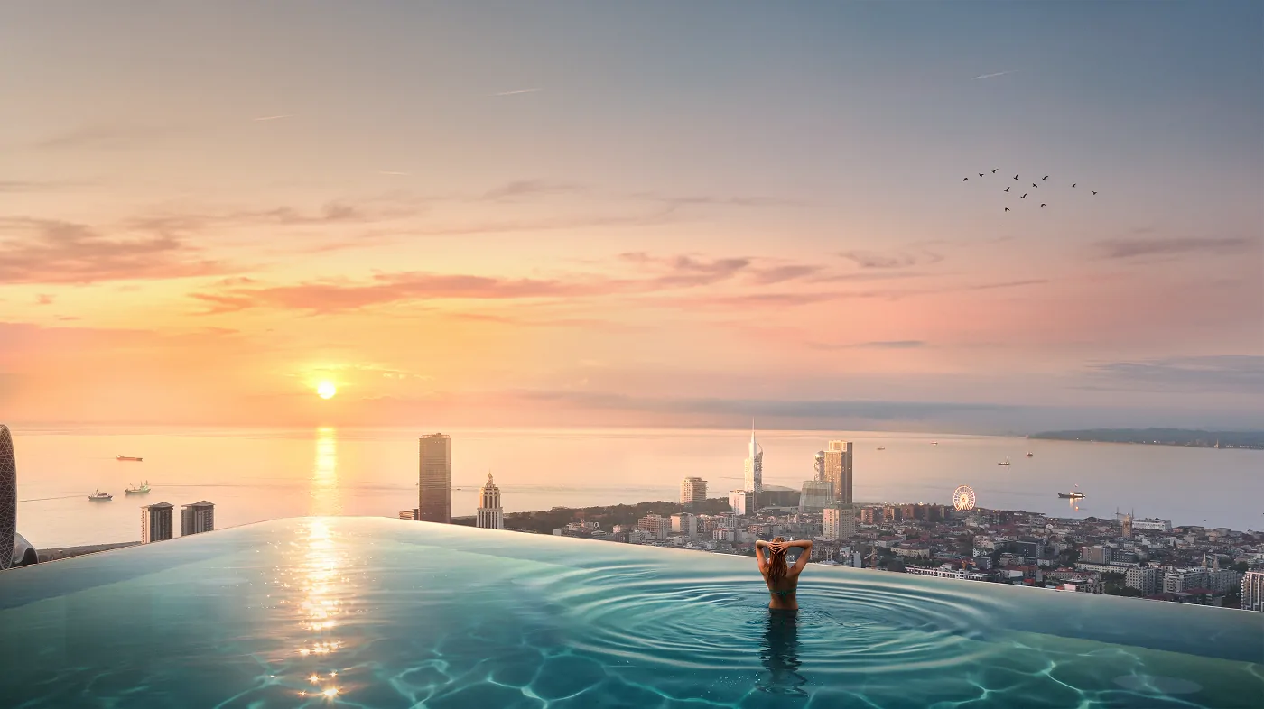 OPUS Signature rooftop infinity pool at sunset over the Black Sea